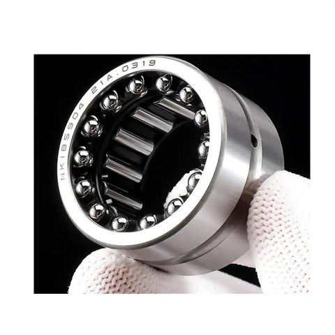 Double Row Needle Roller Bearing Kit Angular Contact Design Precision Pressed Steel Built Different For High Loads Featuring Tight Seals To Resist Wear And Tear On Machinery Using 65x90x38mm To Provide Reliability And Today. 65x90x38mm steel bearing, held by gloved hand