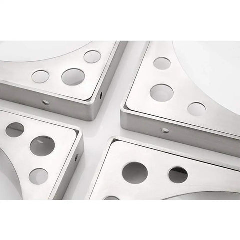 Heavy Duty Triangular Wall Bracket Stainless Steel Shelf Support Large Space Saving Desk Corbel No Sweat Setup For Dining Tables And Heavy Loads Wood Grain Finish. Close-up view of triangular steel brackets with circular holes.