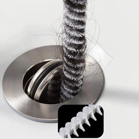 Flexible Drain Snake Cleaner Brush That Kicks Out Greasy Gunk Reusable Spiral Hair Removal Tool With Comfort Grip Handles For Sinks Showers And Bathtubs In White removing hair from a drain.