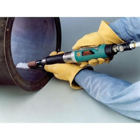 Top Shelf One Hp Straight Line Air Die Grinder With Six Inch Extension Bar Featuring Eighteen Thousand Rpm Rear Exhaust and Dual Quarter Plus Six Mm Collets For Mean Grind Jobs That Kick Serious Tail in use on metal pipe.