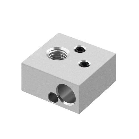 Aluminum hotend block from the Dope MK8 Nozzle Kit For 3D Printers with threaded and drilled holes for fittings.