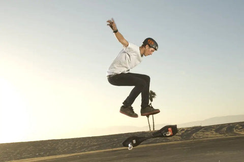 Person performing trick on RipStik Caster Board Classic Collection Two Wheel Skateboard With 360 Degree Casters For Kids Teens And Adults