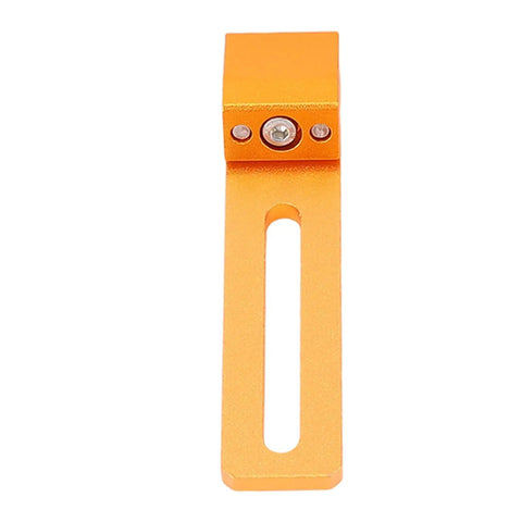 Orange CNC Workpiece Positioning Fixture Kit with Vise Clamp for T Slot tables, close-up of metal component for precision machining