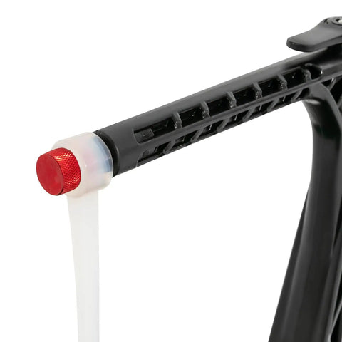 Close-up of adjustable golf swing and hitting trainer arm, showing durable rubber and metal construction, red end cap.