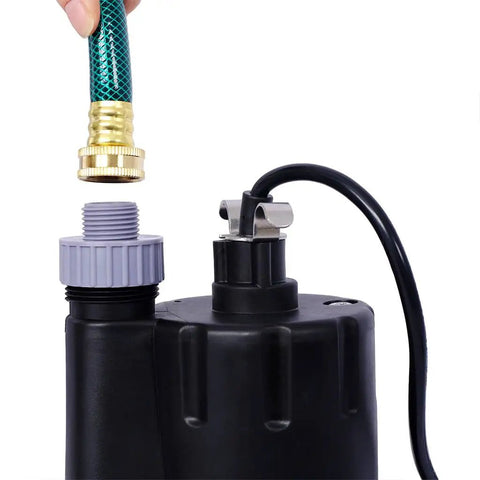 Heavy Duty Quarter Hp Submersible Sump Pump With Solid Grip And 10 Ft Power Cord connecting to a garden hose for easy drainage.
