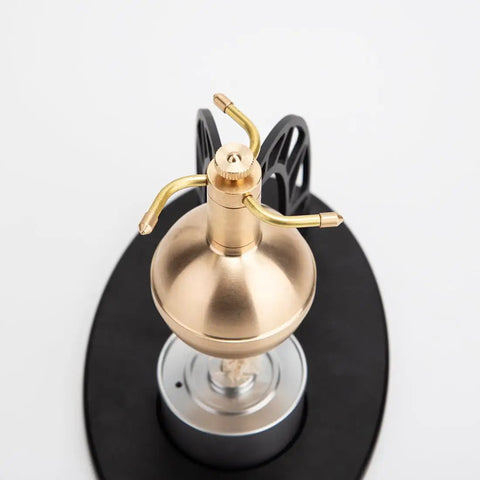 DIY Hands On Ancient Steam Engine Kit For Home Labs, Build Your Own Steam Ball Model And See Real Rotary Motion In Action, Runs Off An Alcohol Lamp, Compact Black Demonstrator 5.79 X 3.74 X 4.92 Inches brass steam engine on black base
