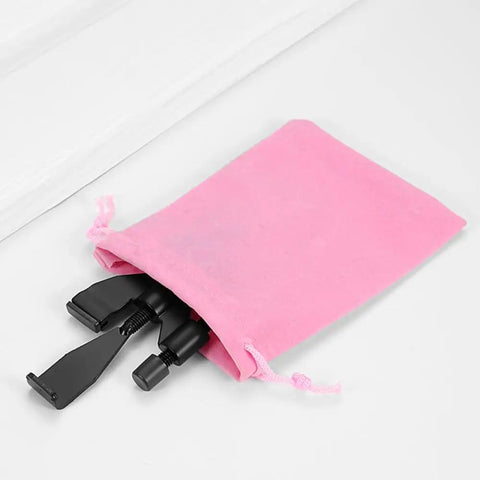 Heavy Duty Black Portable Door Lock With Adjustable No Drill Wing Design Provides Serious Room Security And Delivers Rock Solid Peace Of Mind For Travelers Living Alone in a pink pouch.