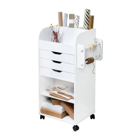 Game Changing Rolling Craft Storage Cart With Three Roomy Drawers And Broad Open Shelves For Bulk Wrapping Paper Ribbon Spools And DIY Gear Featuring Easy Glide Locking Wheels To Keep Your Studio Hustle Neat, white mobile cart with three drawers and open shelves.