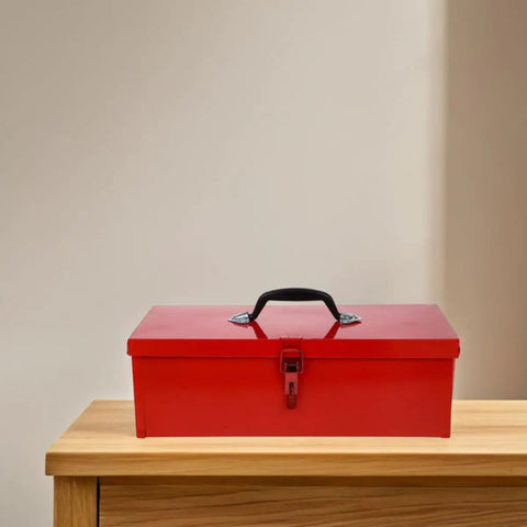 Tough As Nails Red Metal Toolbox Organizer With Secure Latch Closure And Rugged Portable Handle on wooden table.