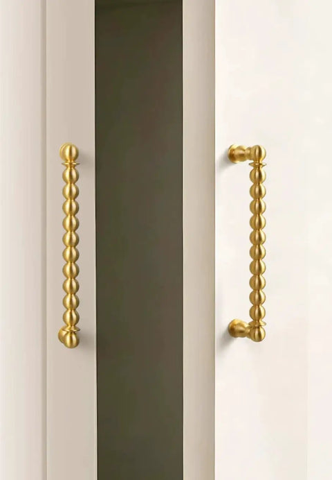 Brushed Brass Ball Drawer Knobs and Cabinet Pulls Set for Kitchen Cabinets and Furniture Hardware, gold tone handles close-up