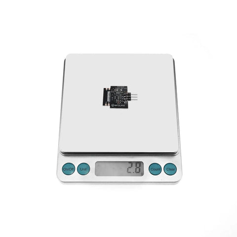 WiFi Link For ESCape32 Open Source ESC Wireless Speed Controller Programmer on digital scale showing 2.8 weight