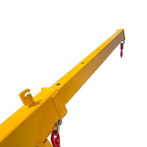 Heavy Hitter Telescoping Forklift Jib Boom Crane Attachment close-up showing yellow jib arm with red hooks for lifting.