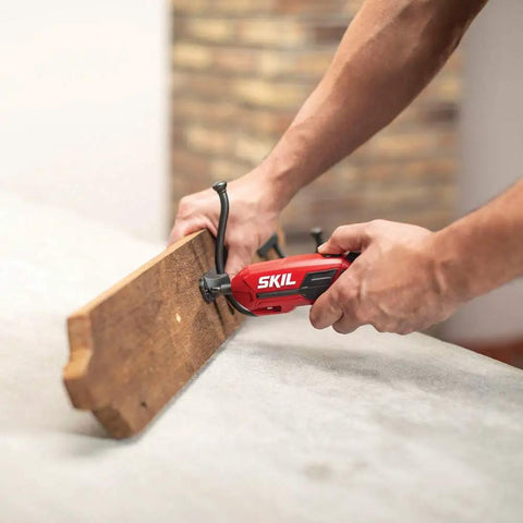 Using Pivot Grip 4V Rechargeable Cordless Screwdriver With 9 Bits, Bit Holder, And USB Charger for a quick DIY fix on wood.