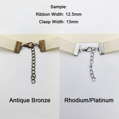 Close-up of 100 Sets Bronze Ribbon Crimps Kit With Lobster Clasps And Chain Extenders for DIY jewelry, showing clasp detail.