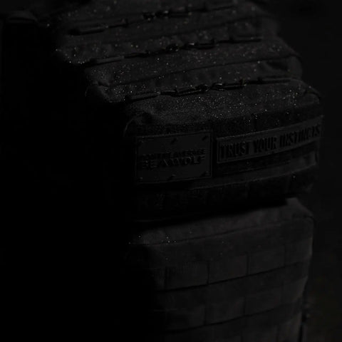 Close-up of 25L Tactical Gym Backpack Nightshade Edition with 1000D Waterproof Oxford Fabric in dim lighting