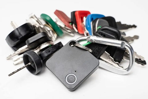 Heavy Equipment Key Master Set With Smart App Locator, featuring multiple keys and black tag for easy locating and management.