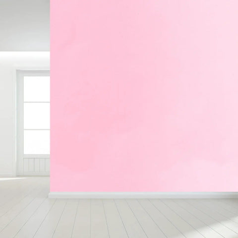 Easy Peasy Peel And Stick Waterproof PVC Pink Wallpaper Roll on a wall in a modern room with natural light.