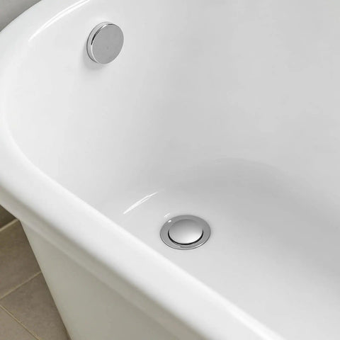 Rotary Bath Tub Plug Drain Stopper for Bathtub Overflow Cover installed in a white bathtub, showcasing its sleek chrome design.