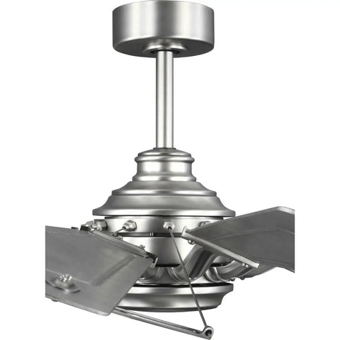 Chic Slick Farmhouse Ceiling Fan With A Tough Antique Nickel Finish And Massive Twelve Blade Windmill Design For That Fresh Modern Rustic Vibe Inside Open Living Spaces, close-up view of the mount and blades.