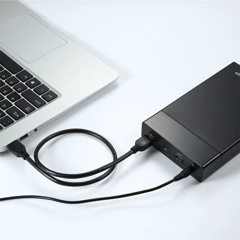 Sata To Usb 3.0 External Hard Drive Enclosure And 3.5 Inch Hdd Docking Station connected to a laptop with USB cable.