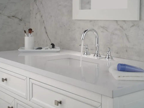 Slick Chrome 8 Inch Widespread Bathroom Sink Faucet Boasting A Totally No Sweat Wrench Free Installation And Quick Connect Tubing paired with a smooth push pop drain assembly.