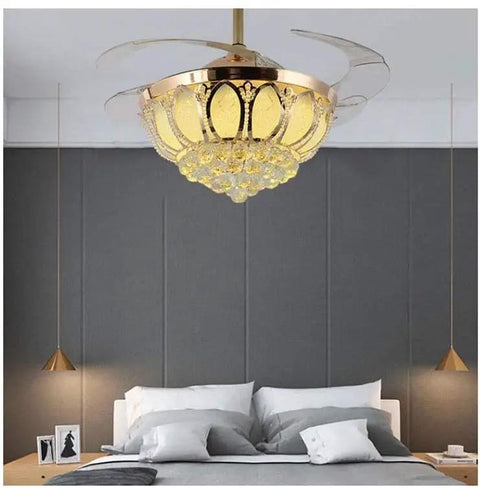Top Notch 52 Inch Gold Ceiling Fan With Light, Fresh Crystal Lotus Frame, illuminating a stylish bedroom with grey accents.