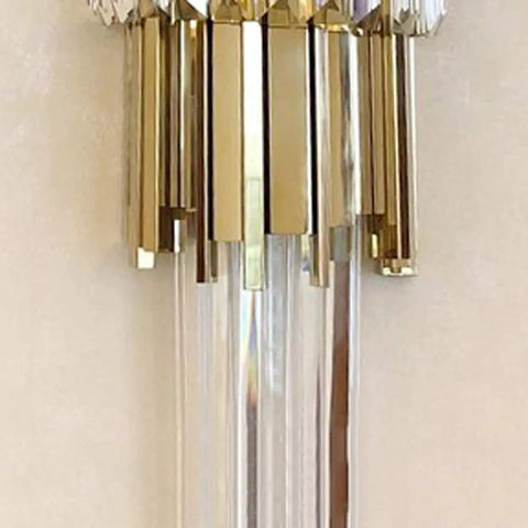 Sleek Led Wall Sconce Textured Crystal Glass Rod Shade Brushed Steel Frame close-up showcasing golden accents and clear rods.