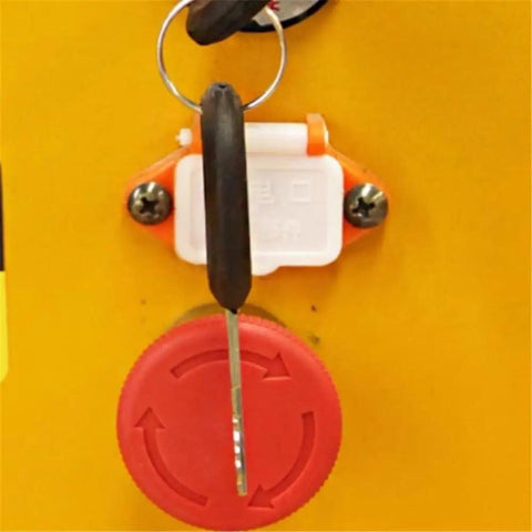 Close-up of control panel showing key switch and red safety button for Heavy Duty Hydraulic Lift Platform With Smooth One Press Raising Thickened Steel Frame And Zero Hassle Four Wheel Maneuvering For Serious Warehouse Shifts And Heavy Hauls.