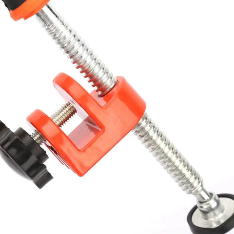 Close-up of Premium Heavy Duty Woodworking Clamp With High Carbon Steel Build, showcasing screw mechanism and grip for carpenters.