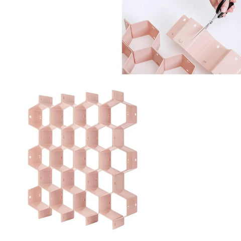 Hella Smooth Honeycomb Drawer Organizer For Closet that fits like a glove, pink ABS plastic grid for sorting socks and ties.