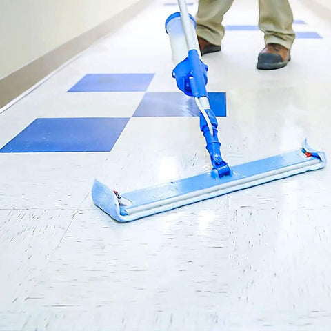 Person using Top Shelf Heavy Duty Floor Cleaning Kit With Stripper Sealer Polish And Cleaner Four Gallon Set on vinyl floor.
