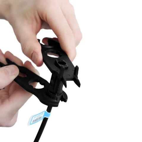 Hands using Solar Panel Connector Assembly Tool for Quick Wire Setup and Easy Disconnects Durable Hard Plastic Build