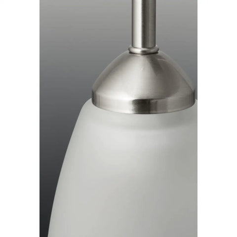 Close-up of Three Light Etched Glass Traditional Chandelier in Brushed Nickel Finish from Gather Collection with white glass shade.