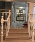White Wooden Balusters Top Tier Quality on staircase with light interior, adding a classic look for easy installation.