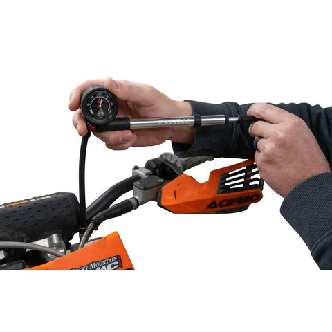 High Pressure Suspension Pump For Motorcycle And Bicycle Air Forks Shocks And Dropper Posts 20 To 300 Psi being used