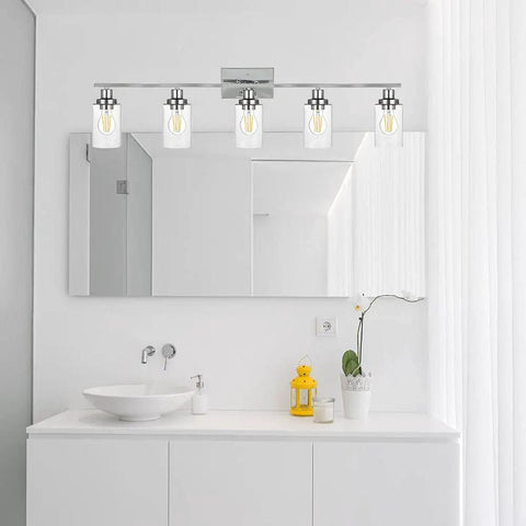 Industrial Chrome Five Light Vanity Light Fixture With Clear Glass Shades Modern Wall Sconces in a white bathroom setting