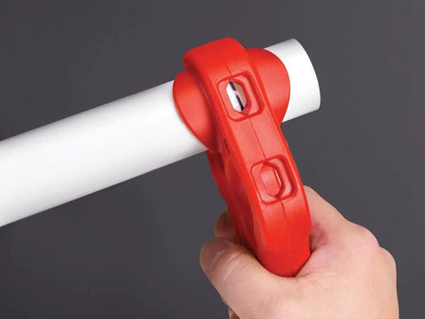 PTEC 30000 Pro Grade Tubular Tailpiece Extension Cutter One And A Quarter Inch Red cutting white PVC pipe