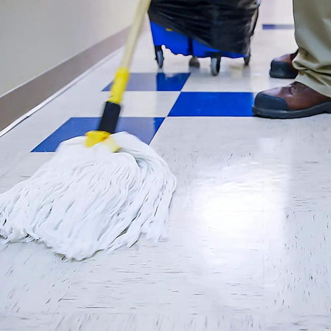 Mop in action on shiny floor, applying Heavy Duty Wet Look Floor Polish Bringing That Sleek High Gloss Shine And Solid Non Slip Shield For Busy Retail Spots And School Lobbies Keeps Flooring Looking Fresh Legit Tough While This Heavy Duty Gallon Hits Different On Scuffs.