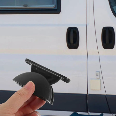 Heavy Duty Nylon Door Catch Retainer Set For Rv Camper Motorhome with secure grip being held near RV door.