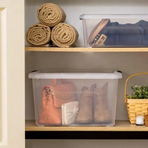 32 Quart Clear Plastic Storage Bins With Easy Snap Lids stackable bins holding shoes and bags on shelves for home organization.