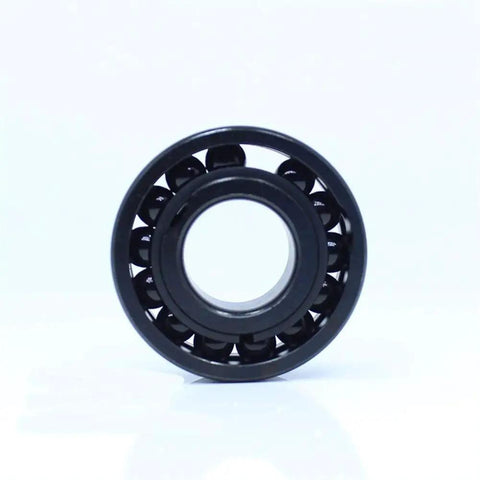 Legit Industrial Grade High Temperature Full Ball Bearing 6205 Solid Steel Construction 25X52X15MM, black design, center view.