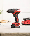 Two Tool Cordless Drill And Right Angle Impact Kit with 12V brushless power displayed on a table with charger and accessories