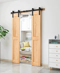5FT Heavy Duty Double Door Sliding Barn Door Hardware Kit installed on light wood doors in a modern room setting