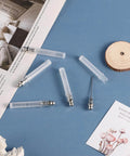 5pcs Grease Injector Needle set on a blue surface, showing small bearing grease needle nozzles and detachable tips for ball joints.
