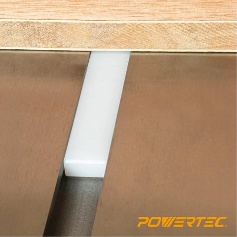 Close-up of Heavy Duty 36 Inch Hdpe Miter Bars 2 Pack Fits Standard 3 4 By 3 8 Inch Slots in a table saw slot.