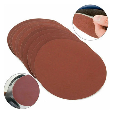 Premium 25-Piece Sanding Discs With Hook Loop Back For Easy Grip And Fast Change Includes Coarse To Fine Grits From 40 Up To 3000 stacked, showcasing different sizes.
