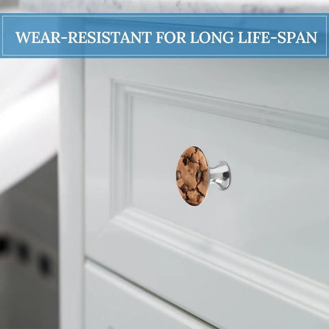 Chocolate Cookie Stainless Steel Cabinet Knobs And Drawer Handles Top Tier Beast Grade Kitchen Furniture Hardware on a white drawer.