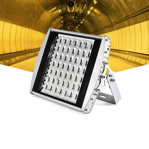 Heavy Duty Led Floodlight Rocked Up With Ip66 Weatherproof Aluminum Spitting Out A Sharp 120 Degree Warm Beam At 70W To 168W, viewed from an angle in a tunnel setting.