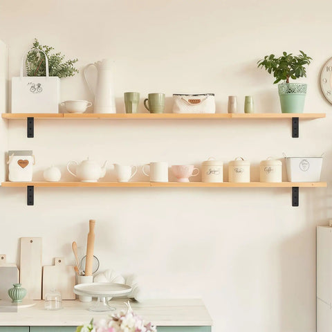 Badass Heavy Duty Floating Shelf Brackets 6 Pack Black Industrial Metal L Brackets holding wooden shelves with decorative items.