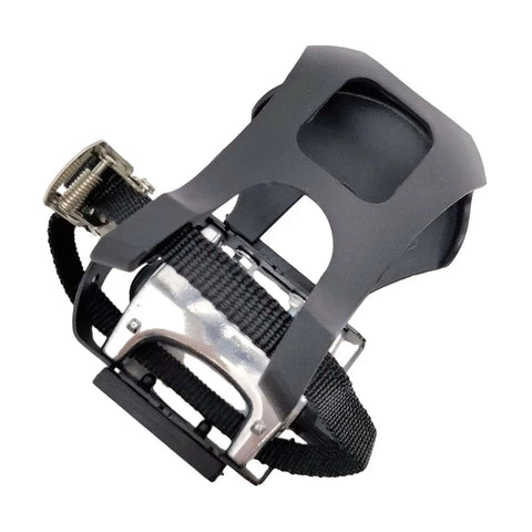 Black bike pedals with toe clips and straps for indoor cycling and home gym training, grippy non-slip surface, right side view.
